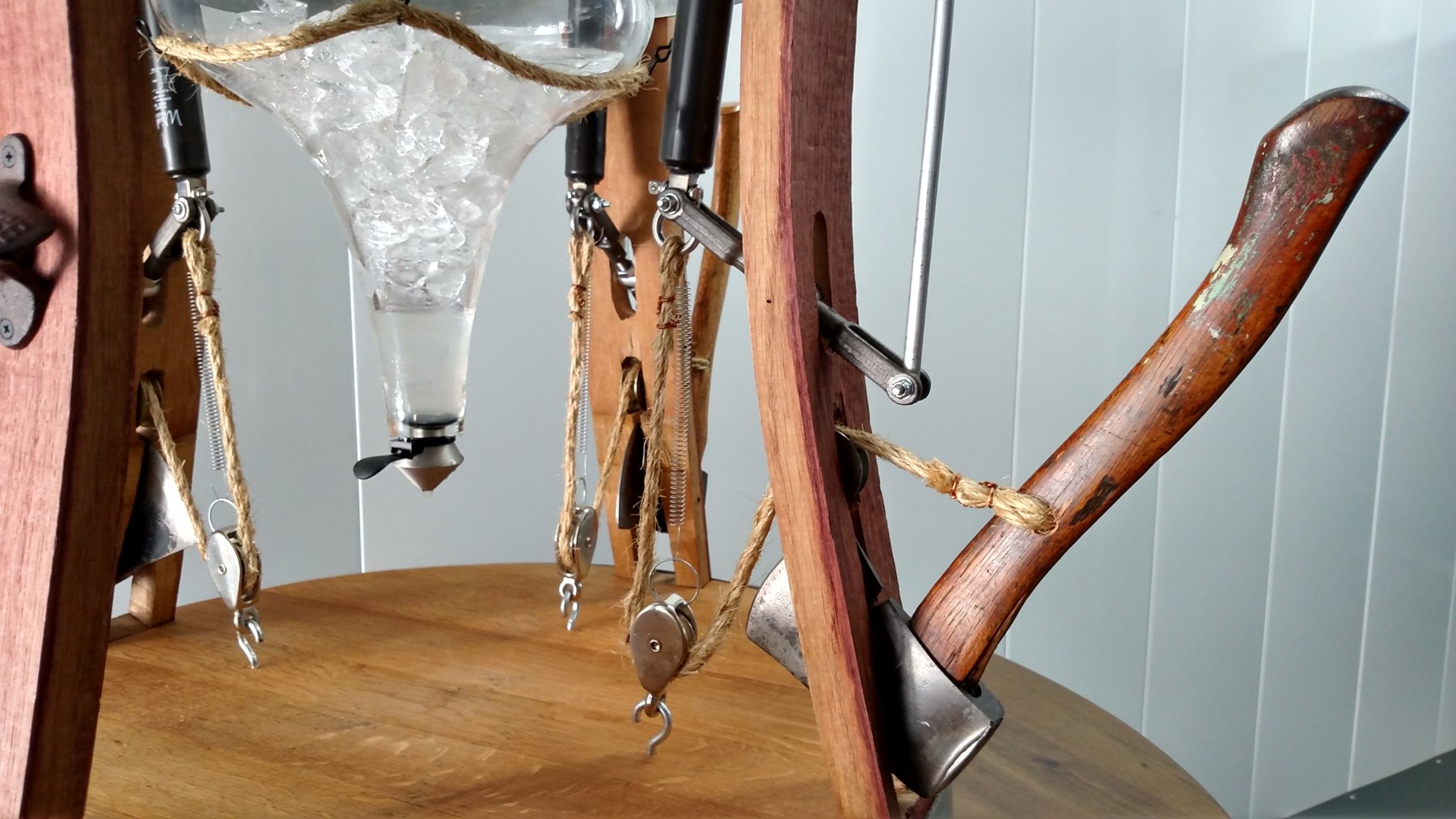 Hatchet handle and glass ice bath